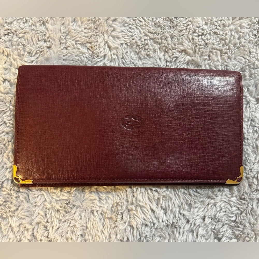 Cartier Bifold Burgundy Leather Wallet with Gold Accents